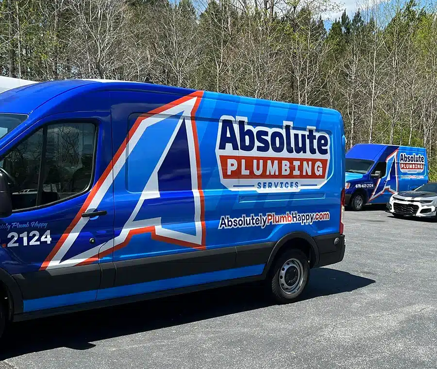 Absolute Plumbing Services van parked outside in Acworth, GA