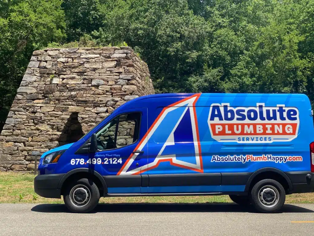 Absolute Pluming van parked outside in Acworth, GA