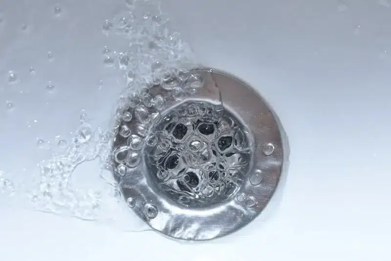 water draining into sink